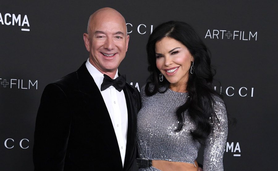 Bezos and Lauren Sanchez attend an event.