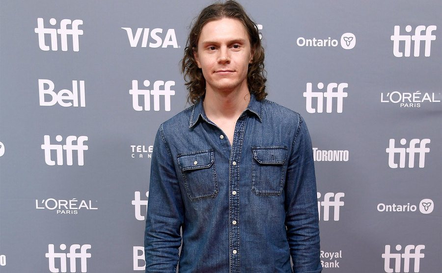 Evan Peters attends an event. 