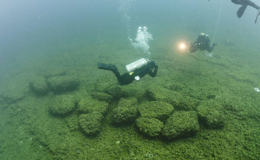 Divers explore the ruins in Lake Huron. 