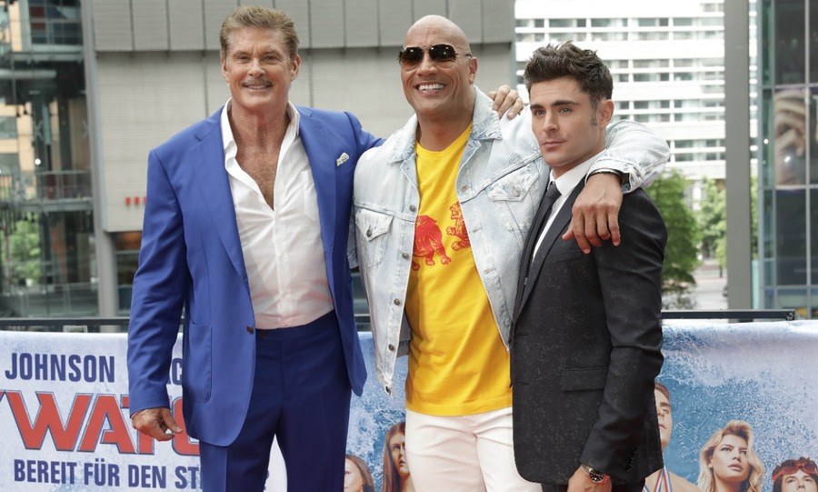 Actors David Hasselhoff (left to right), Dwayne Johnson and Zac Efron